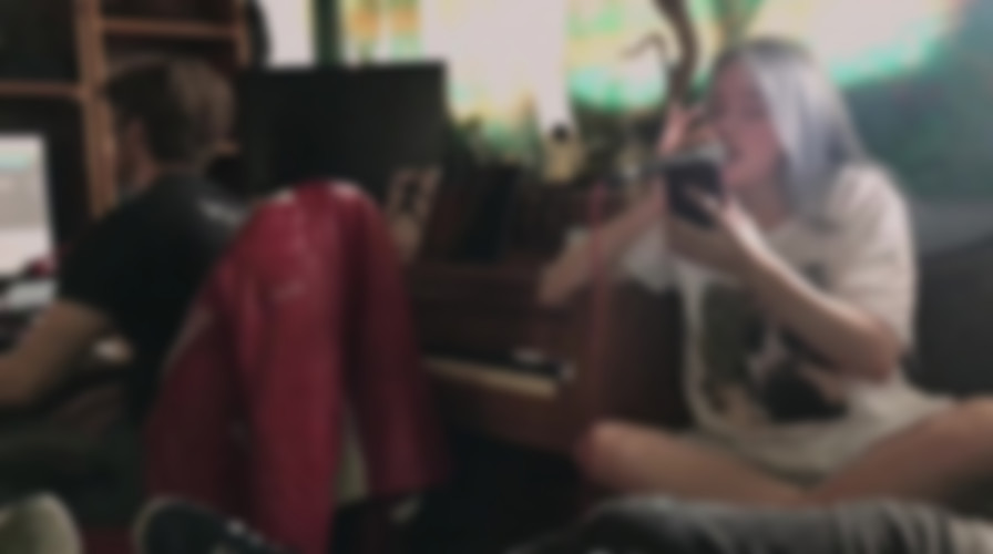 Billie Eilish: The World's a Little Blurry backdrop