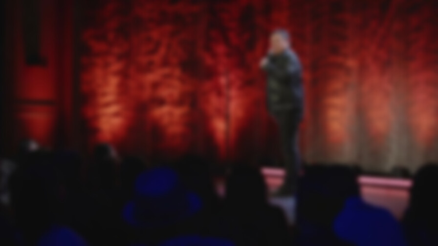 Carlos Mencia: Here I Am backdrop
