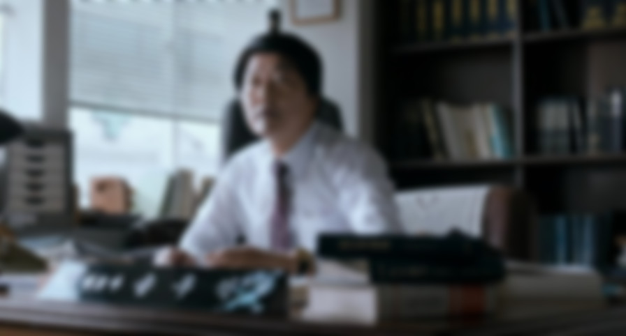 The Attorney backdrop